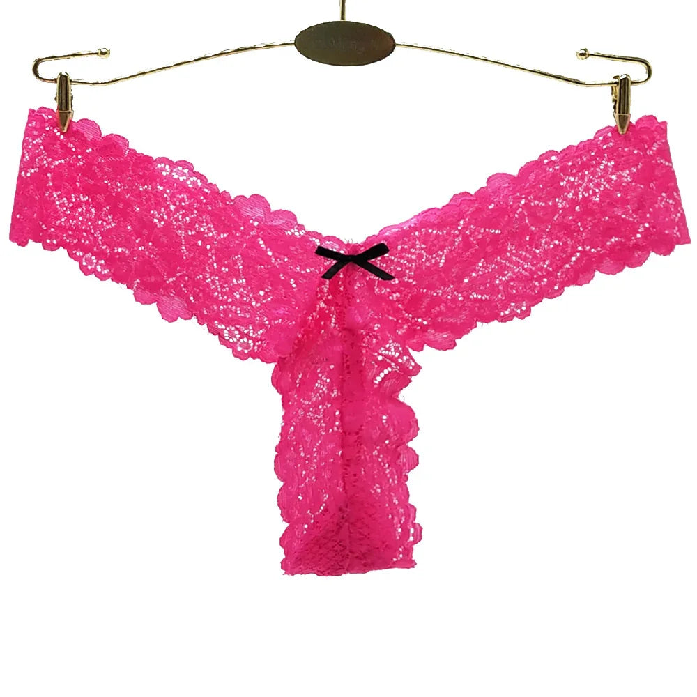 Pink lace thong with black bow, elegant women's lingerie on gold hanger